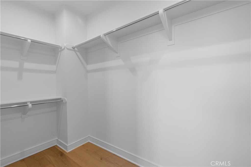 128 Tomahawk Irvine, CA 92618 - Photo 37 of 62 a view of a room with racks on the wall