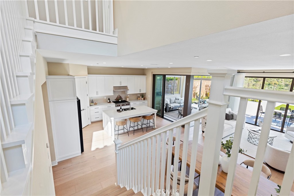 128 Tomahawk Irvine, CA 92618 - Photo 40 of 62 a view of a kitchen with furniture and staircase