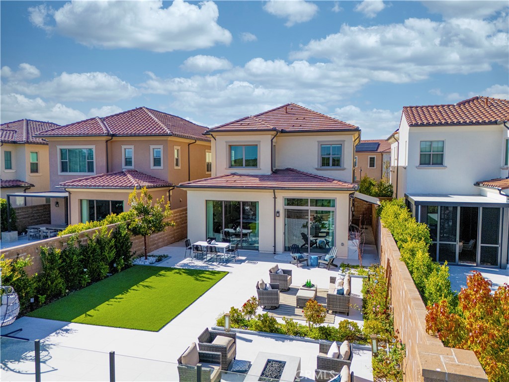 128 Tomahawk Irvine, CA 92618 - Photo 43 of 62 a front view of a house with garden