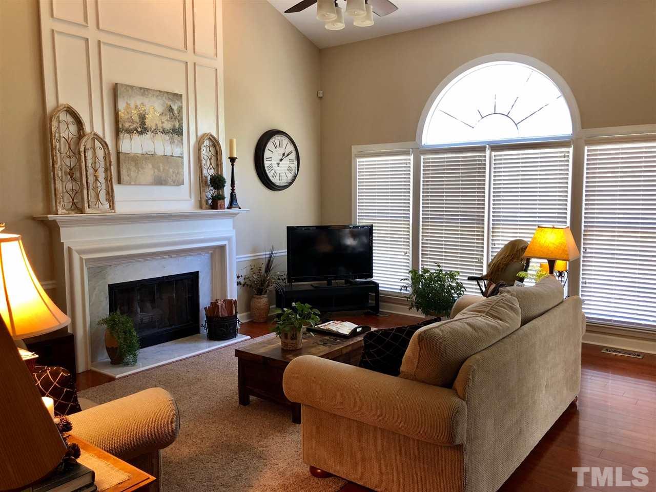2604 Iman Drive Raleigh, NC 27615 - Photo 7 of 23 Enjoy the floor to ceiling gas logs