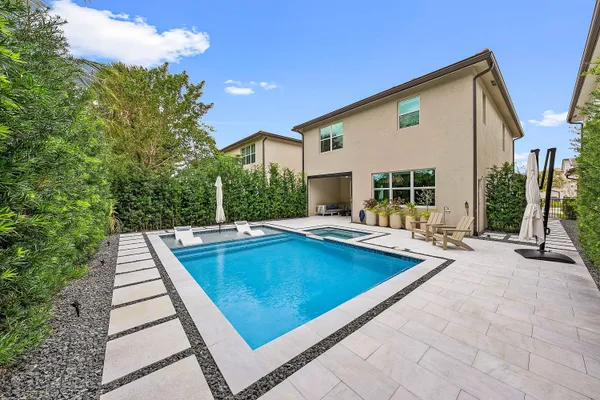 a view of a house with swimming pool