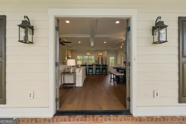 a view of an entryway with garden