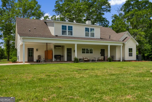 a view of a golf course with a building