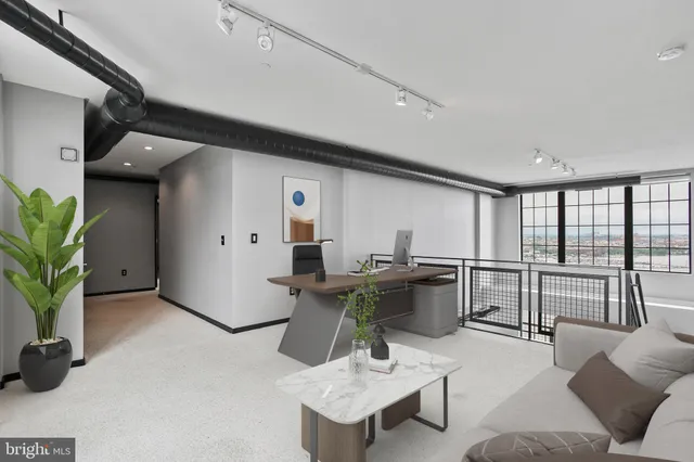 a kitchen with a table and chairs in it