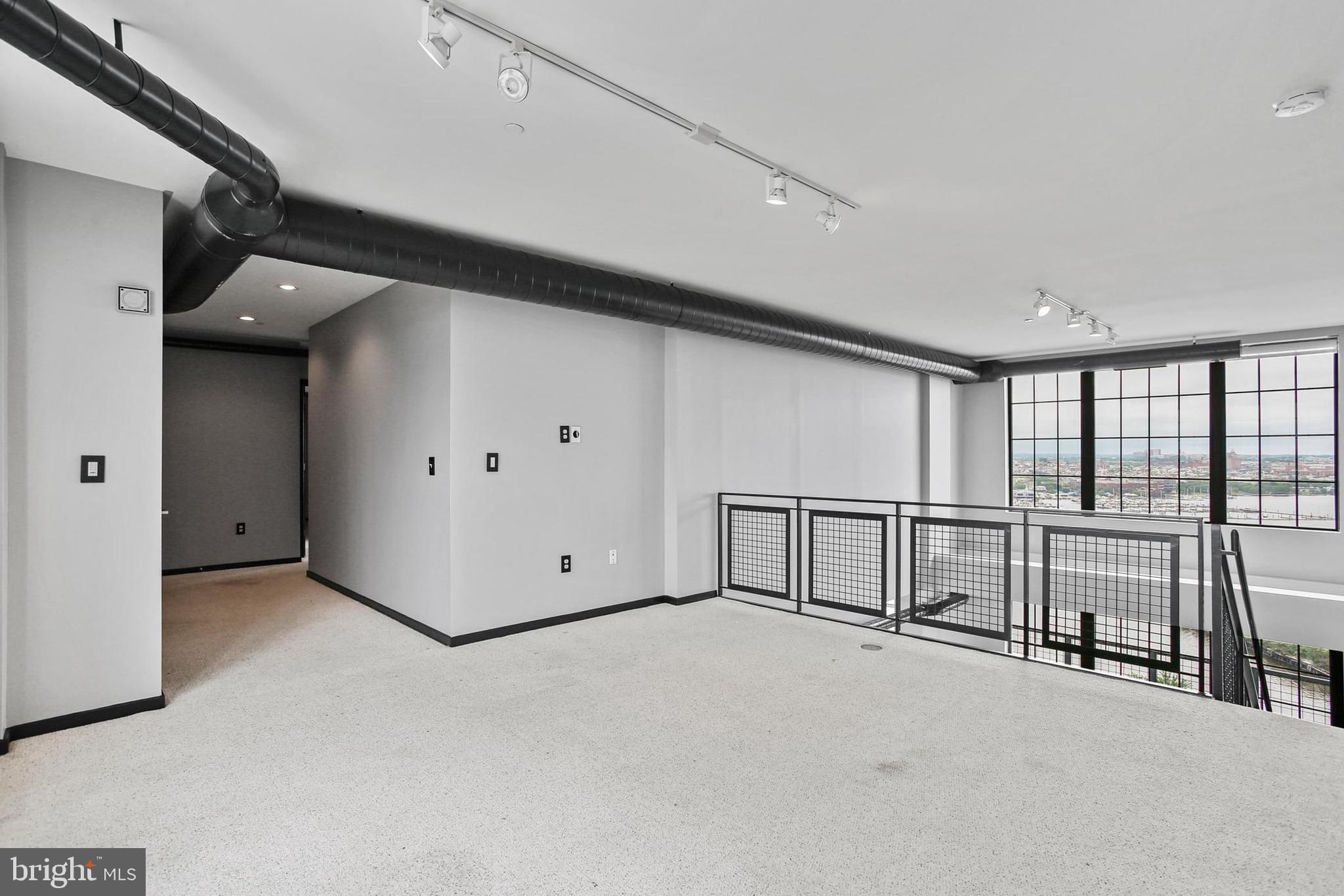 1200 Steuart Street, Unit 1913 Baltimore, MD 21230 - Photo 20 of 39 a view of an empty room