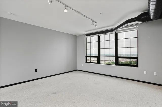 a view of an empty room with window