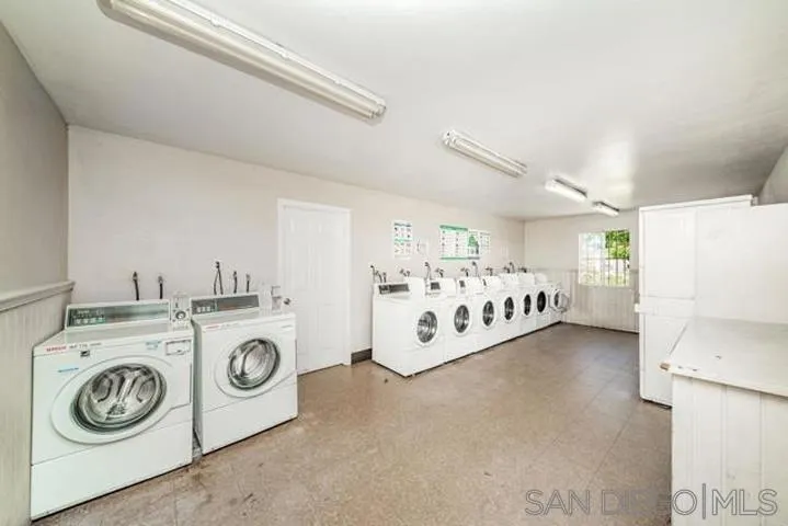 1050 Rock Springs Road, Unit 240 Escondido, CA 92026 - Photo 18 of 21 a utility room with dryer and washer