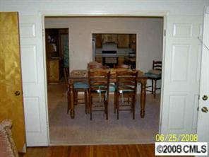 702 Miles Road Dallas, NC 28034 - Photo 5 of 7 a view of a dining room with furniture