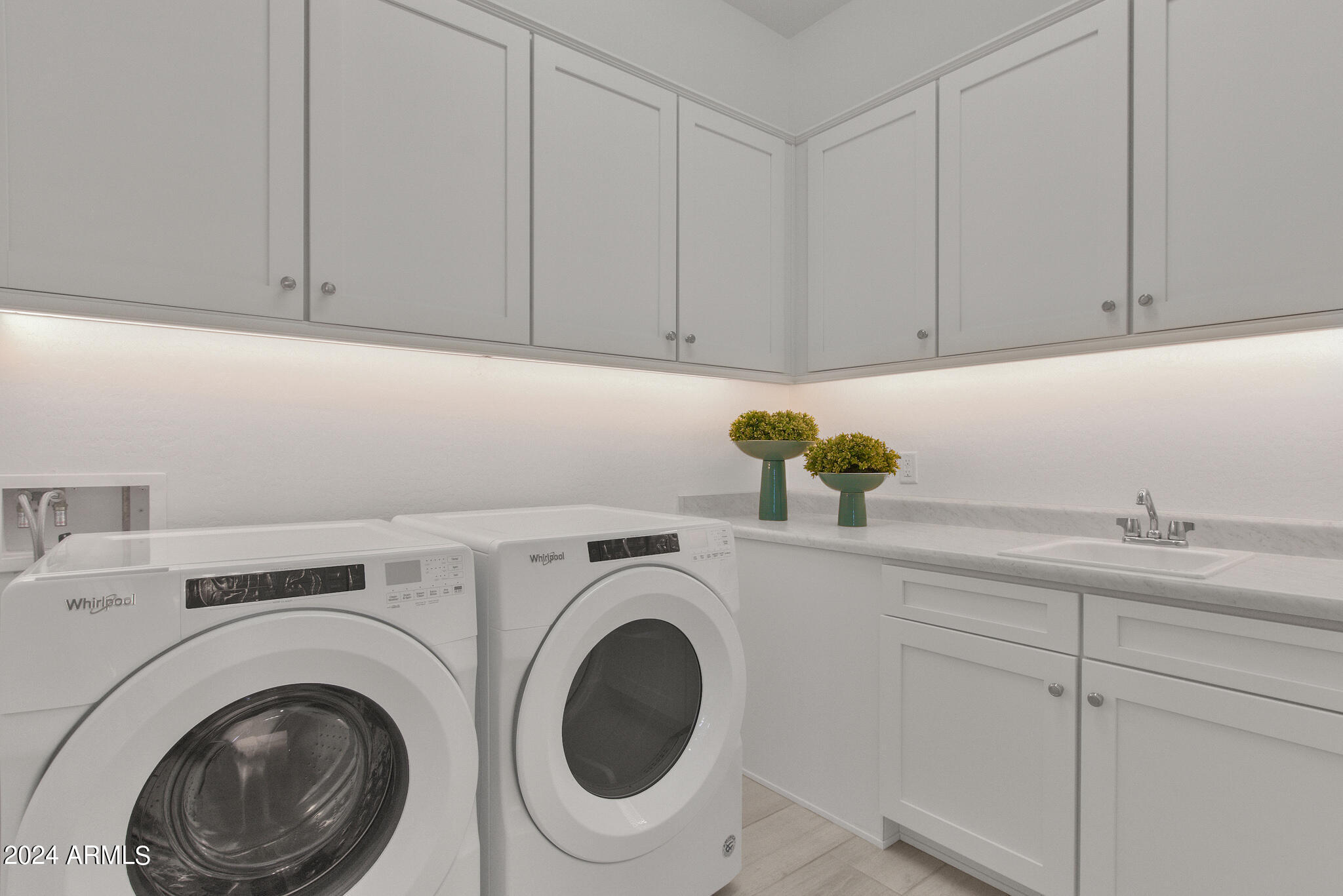 3654 East Roland Street Mesa, AZ 85213 - Photo 7 of 10 Spacious Laundry room with cabinets