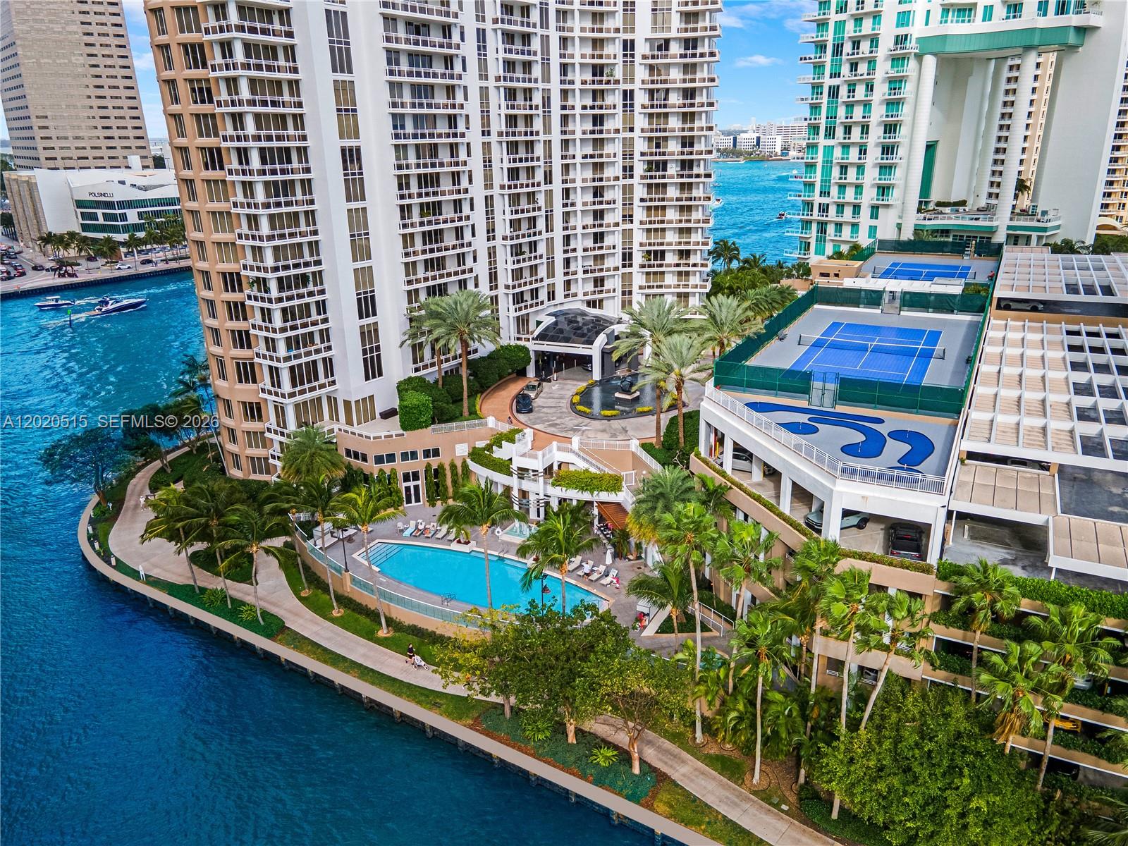 901 Brickell Key Boulevard, Unit 609 Miami, FL 33131 - Photo 23 of 27 Pool, BBQ area, tennis courts