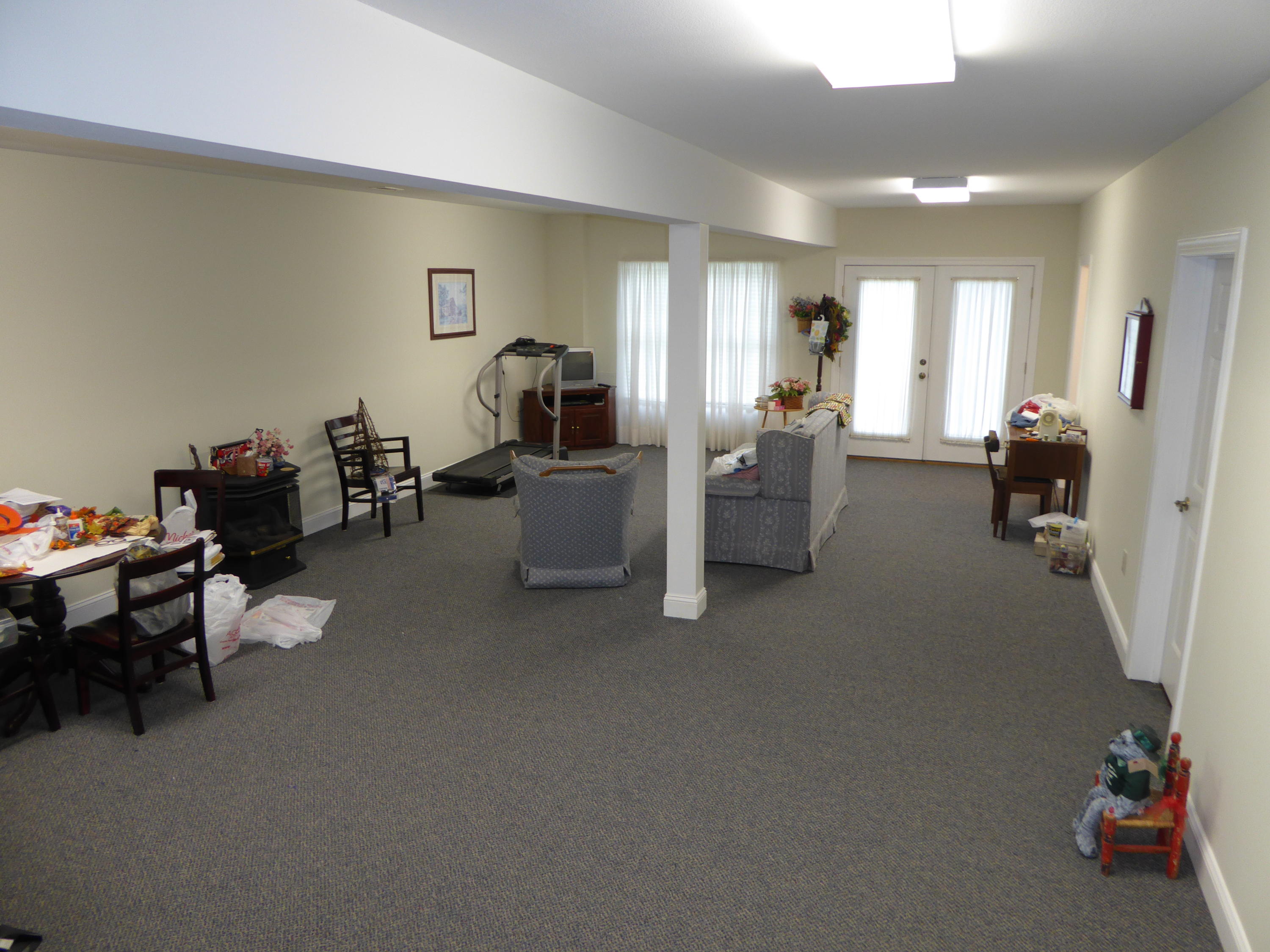 12419 Callaway Road Callaway, VA 24067 - Photo 13 of 96 a living room with furniture and a wooden floor
