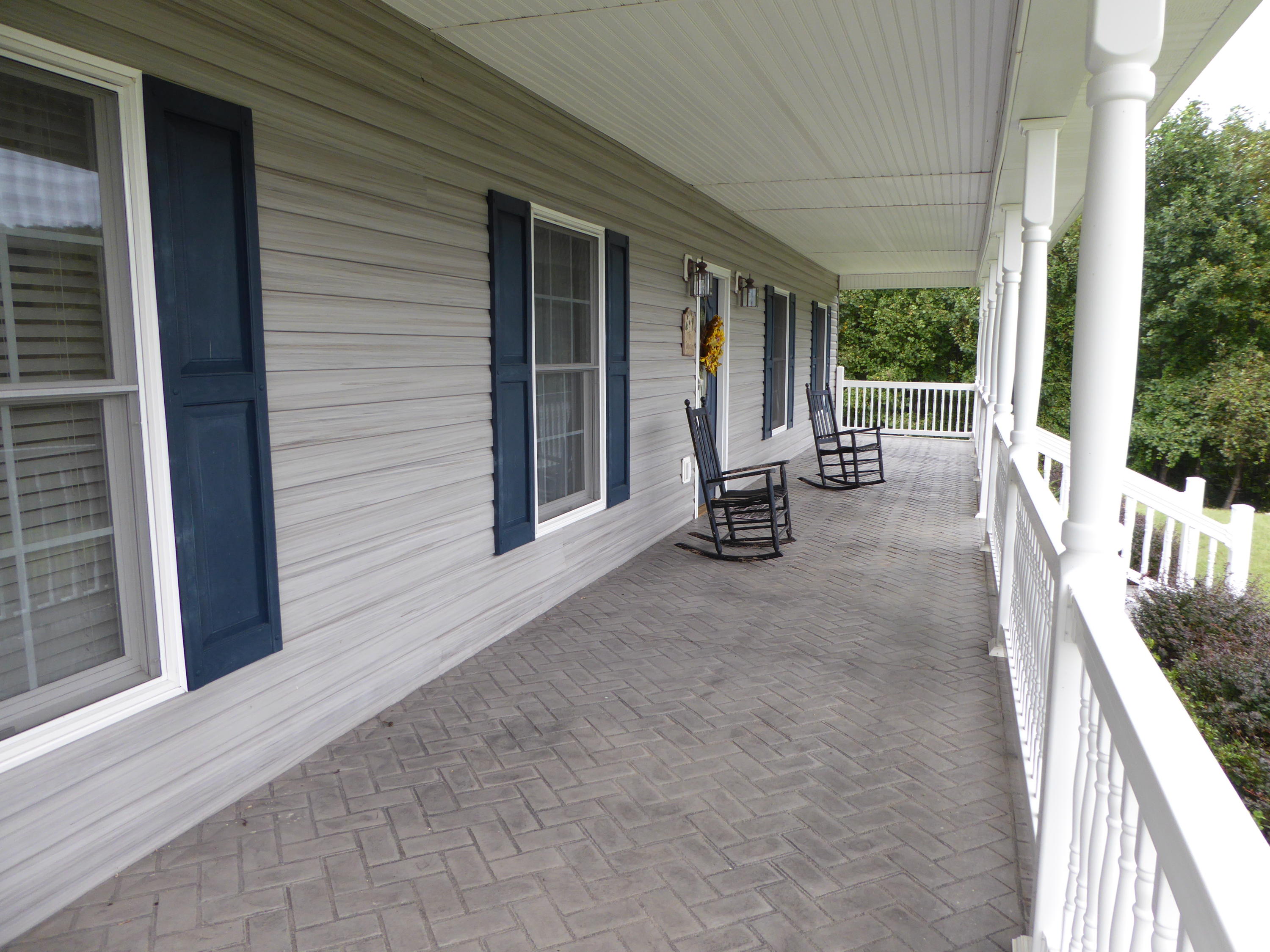 12419 Callaway Road Callaway, VA 24067 - Photo 18 of 96 a view of a house with backyard and porch