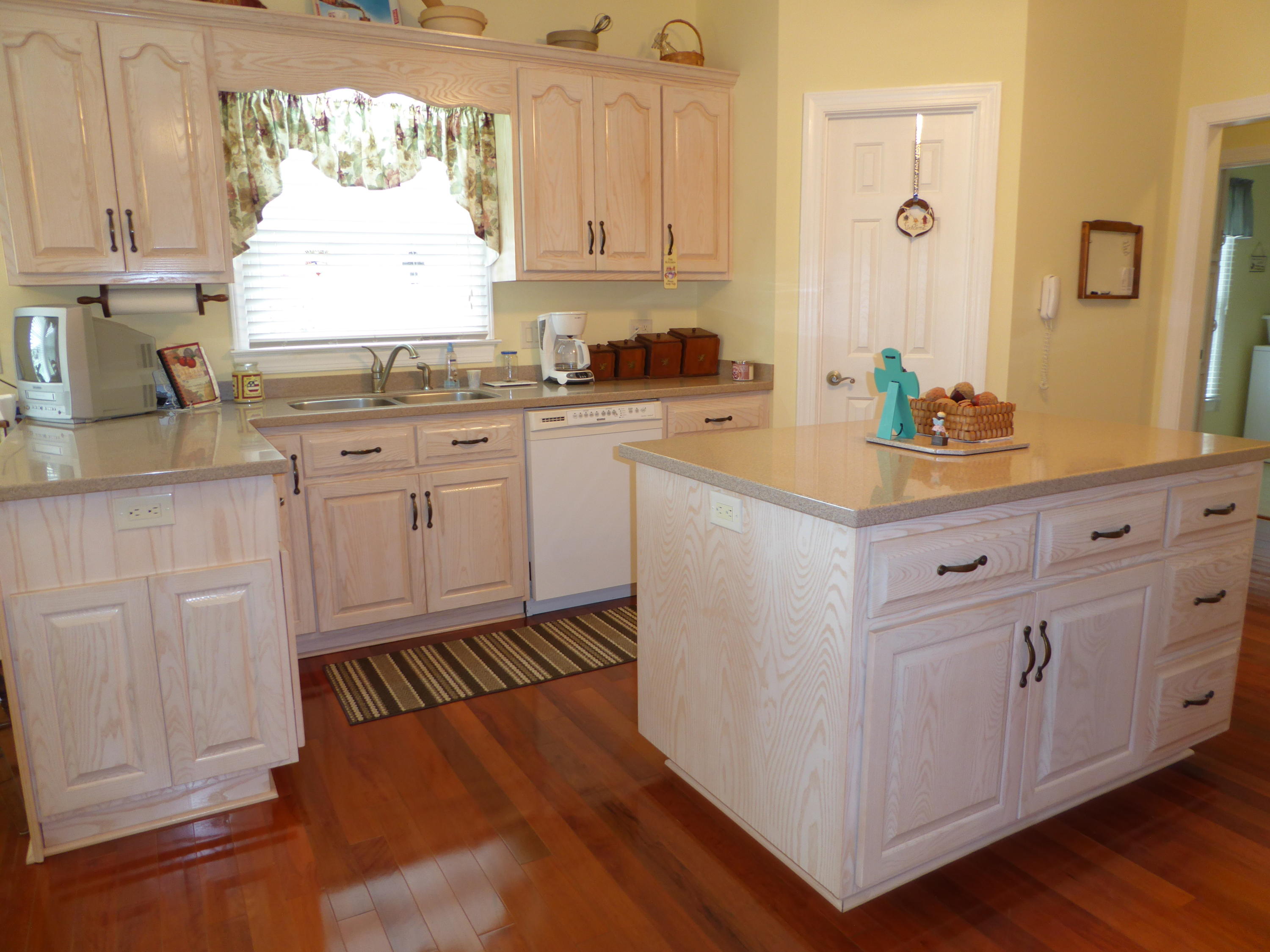 12419 Callaway Road Callaway, VA 24067 - Photo 3 of 96 a kitchen with white cabinets and sink