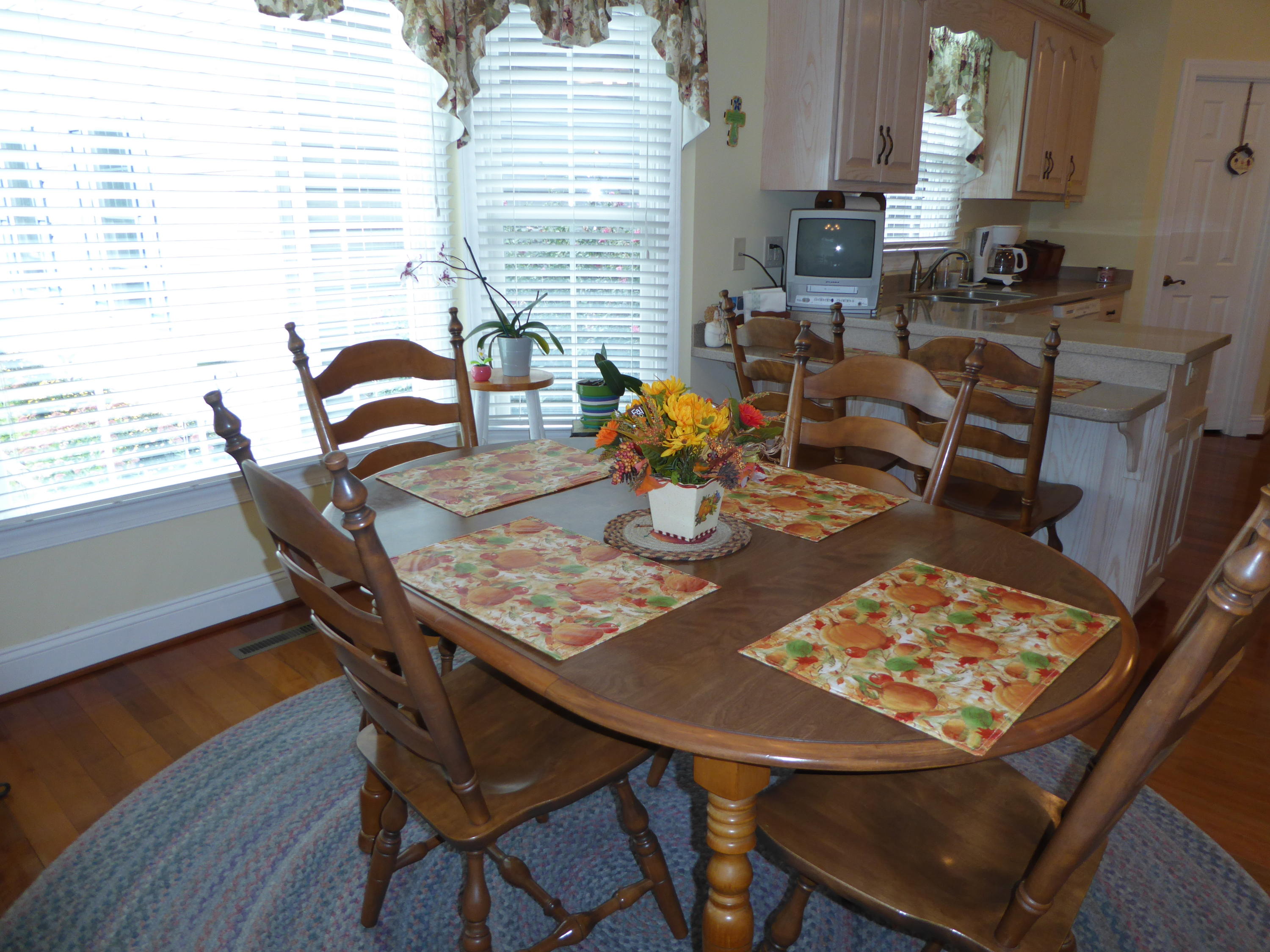 12419 Callaway Road Callaway, VA 24067 - Photo 29 of 96 a view of a dining table and chairs in the kitchen