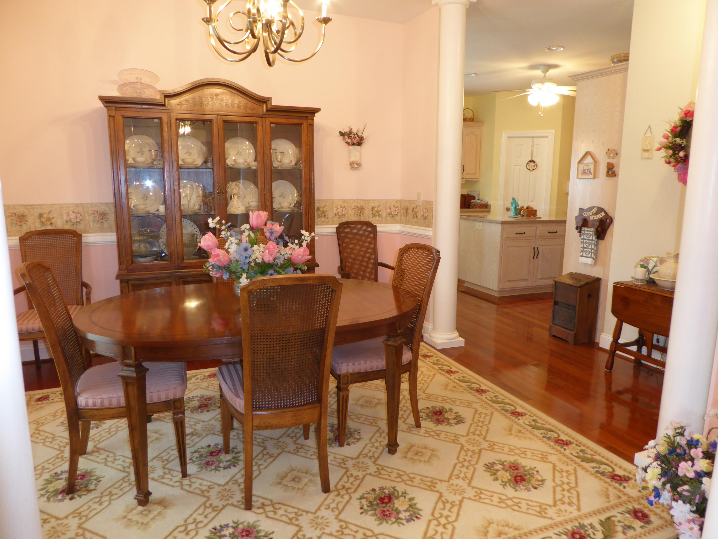 12419 Callaway Road Callaway, VA 24067 - Photo 30 of 96 a view of a dining room with furniture and a chandelier
