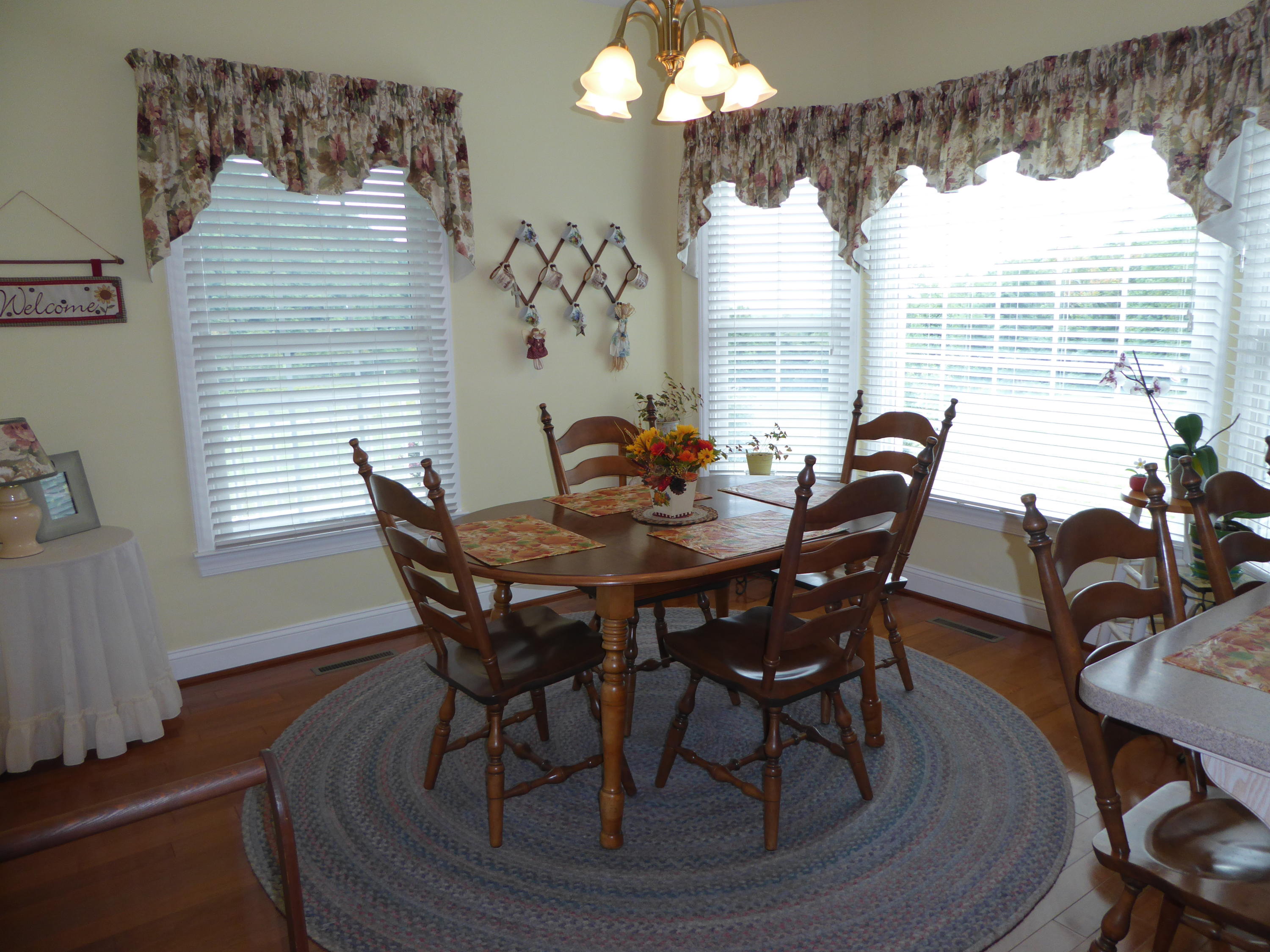 12419 Callaway Road Callaway, VA 24067 - Photo 5 of 96 a view of a dining room with furniture and windows