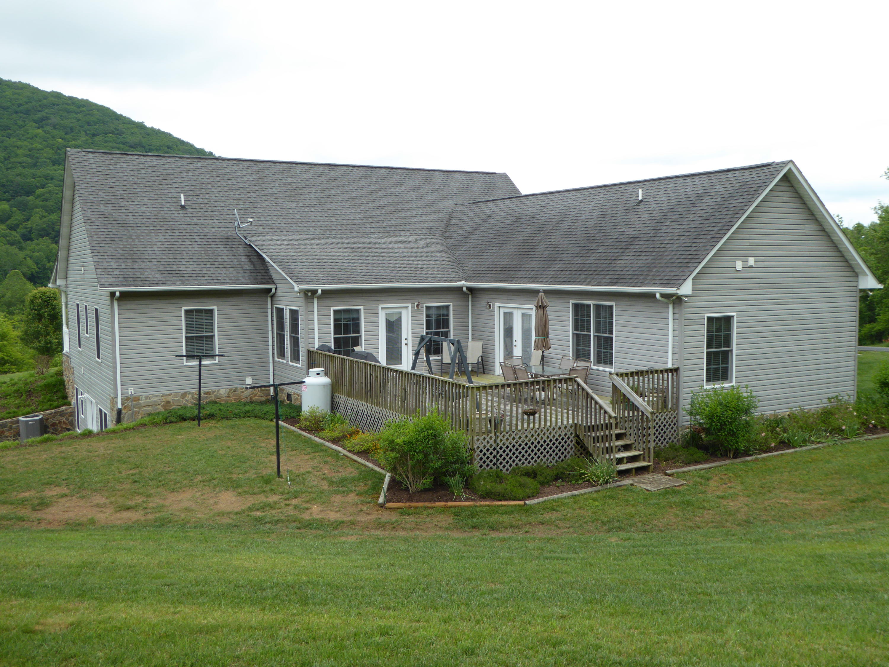 12419 Callaway Road Callaway, VA 24067 - Photo 54 of 96 a front view of house with yard and glass windows