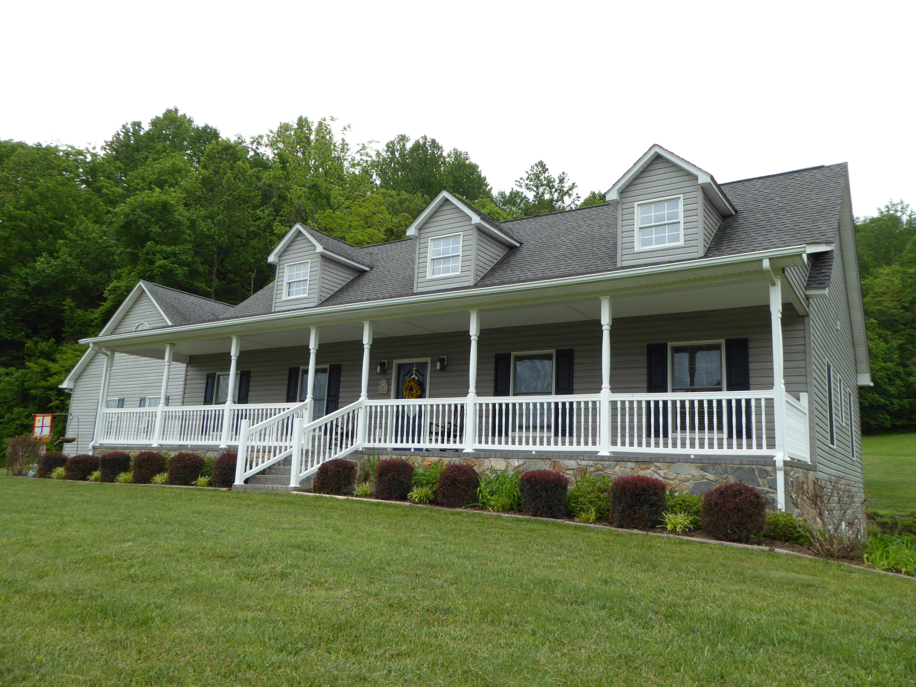 12419 Callaway Road Callaway, VA 24067 - Photo 70 of 96 a front view of a house with a garden