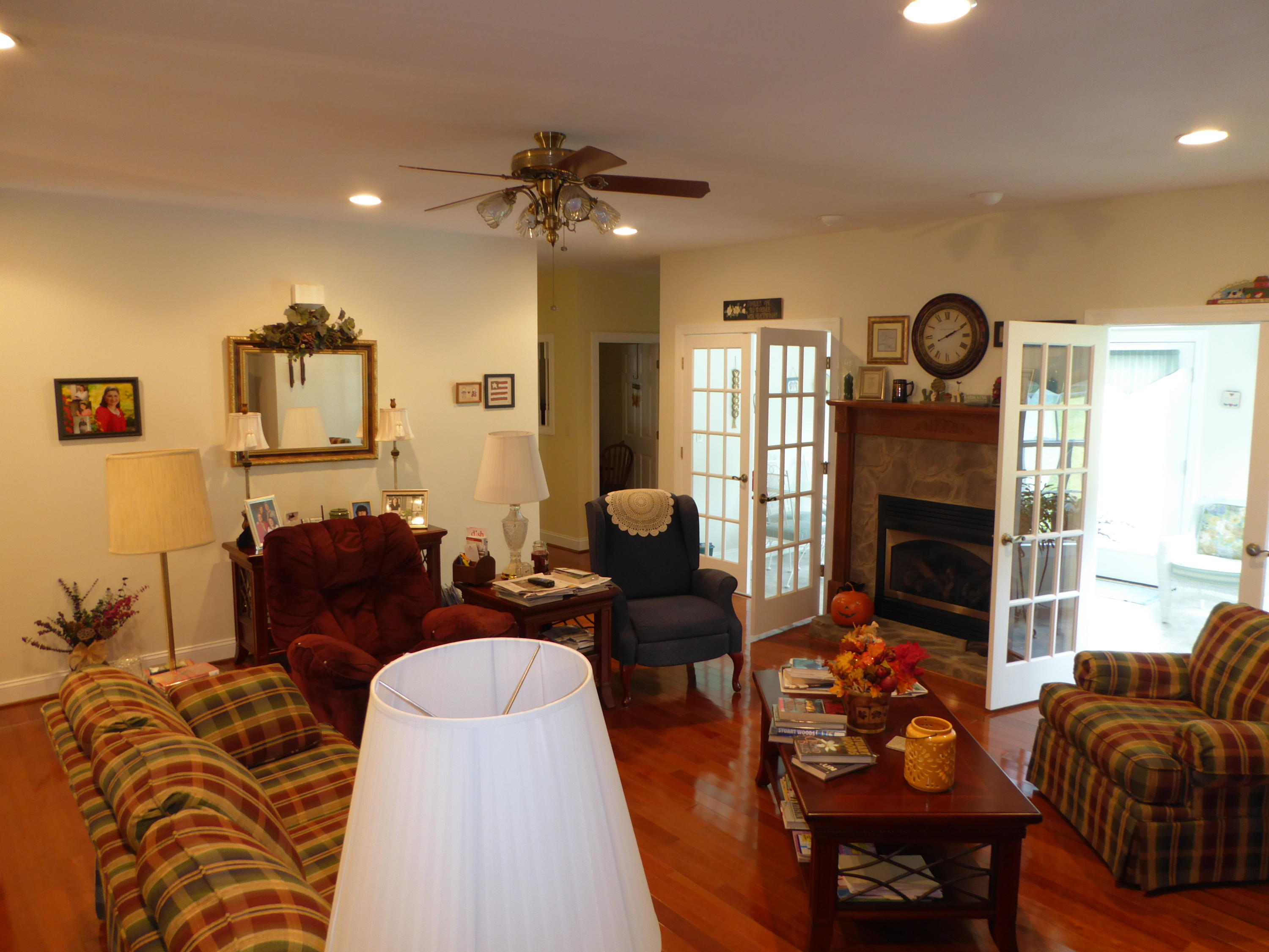 12419 Callaway Road Callaway, VA 24067 - Photo 75 of 96 a living room with furniture a fireplace and a flat screen tv