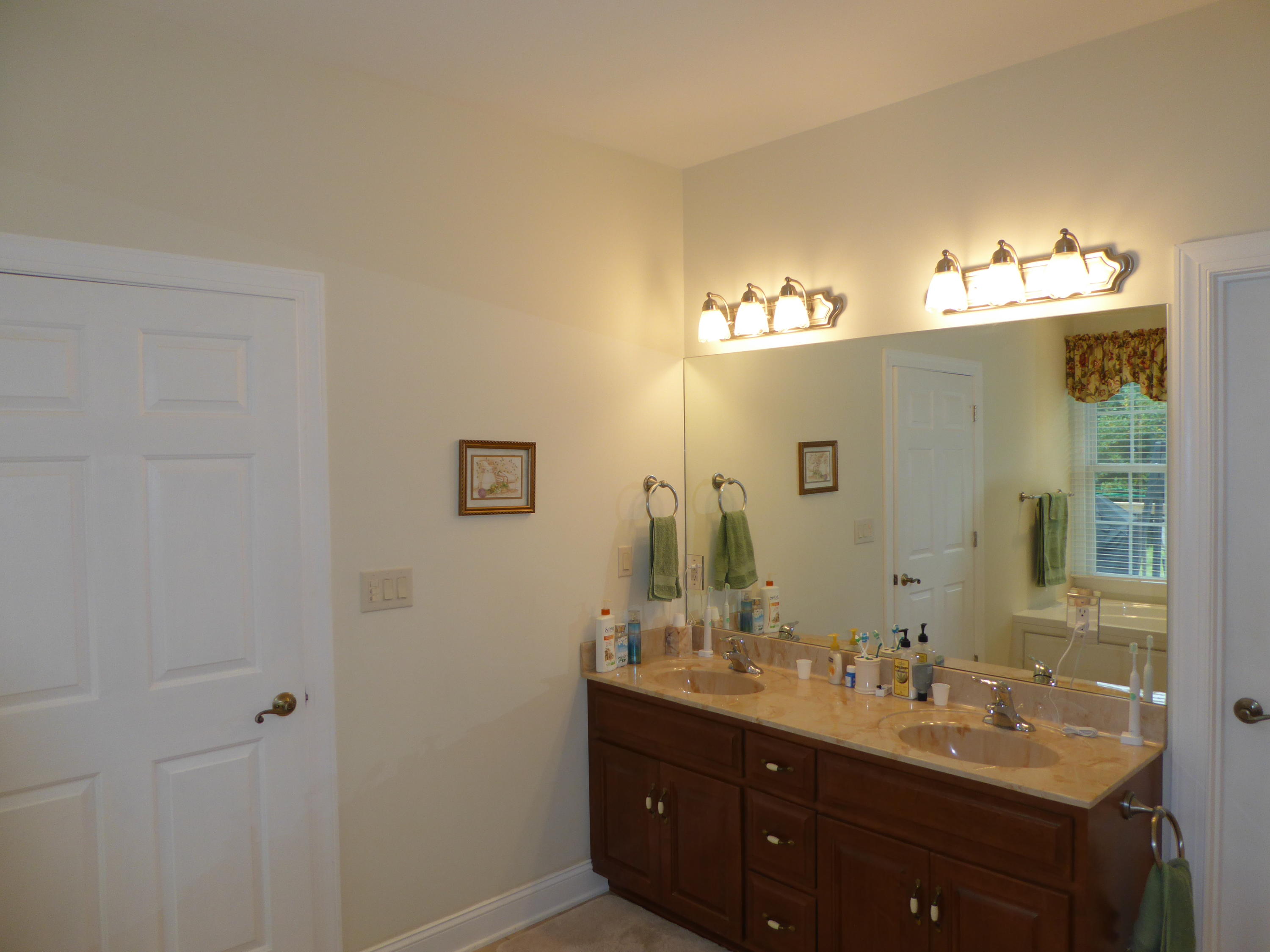 12419 Callaway Road Callaway, VA 24067 - Photo 83 of 96 a bathroom with a double vanity sink and mirror