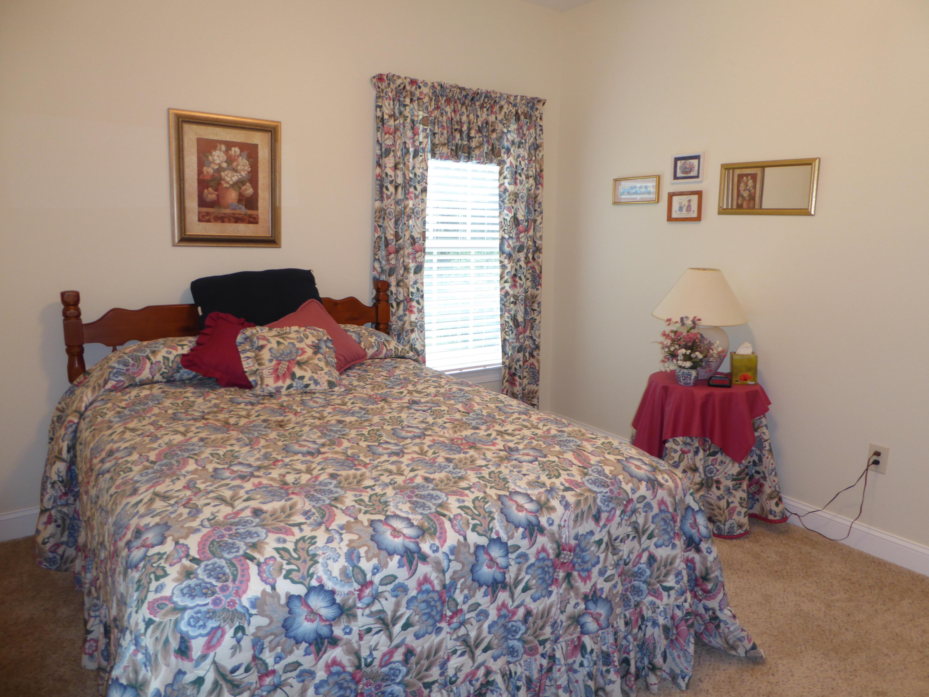 12419 Callaway Road Callaway, VA 24067 - Photo 84 of 96 a bedroom with a bed and a lamp on dresser