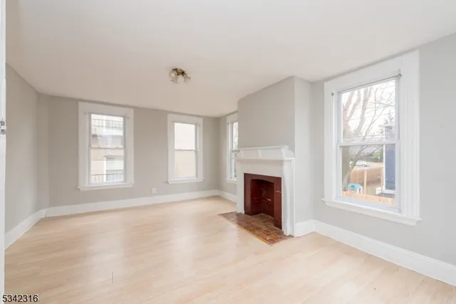 a view of empty room with windows