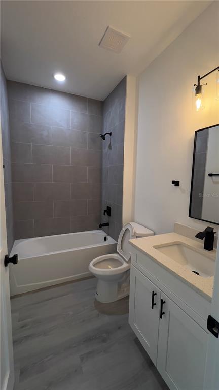 16734 Southwest 18th Avenue Road Ocala, FL 34473 - Photo 25 of 36 a bathroom with a sink a toilet and shower
