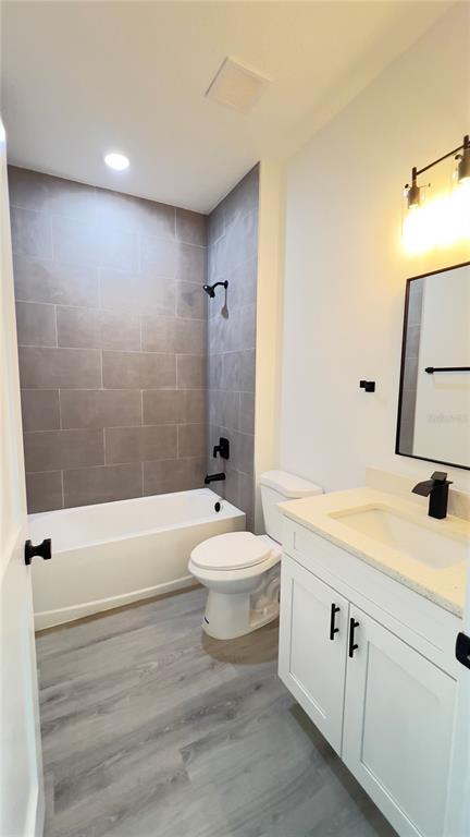 16734 Southwest 18th Avenue Road Ocala, FL 34473 - Photo 26 of 36 a bathroom with a sink a toilet and a bathtub