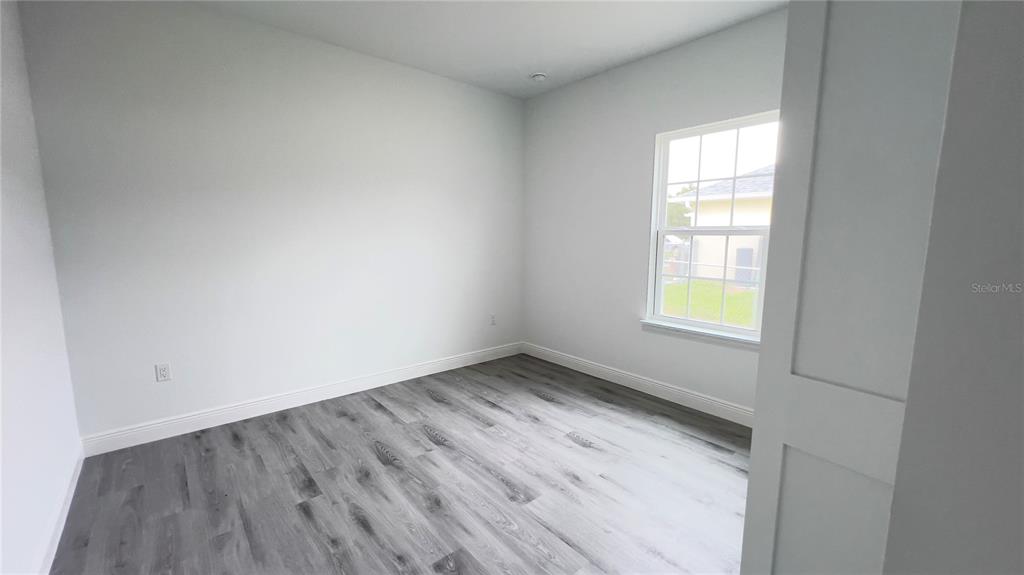 16734 Southwest 18th Avenue Road Ocala, FL 34473 - Photo 29 of 36 an empty room with a window