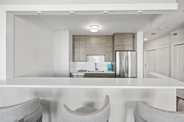 a bathroom with a bathtub and a sink