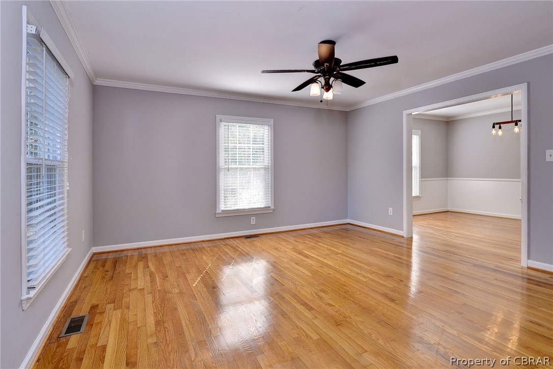 137 Wilderness Road Hampton, VA 23669 - Photo 45 of 45 Unfurnished room featuring ceiling fan, light hardwood / wood-style floors, and crown molding