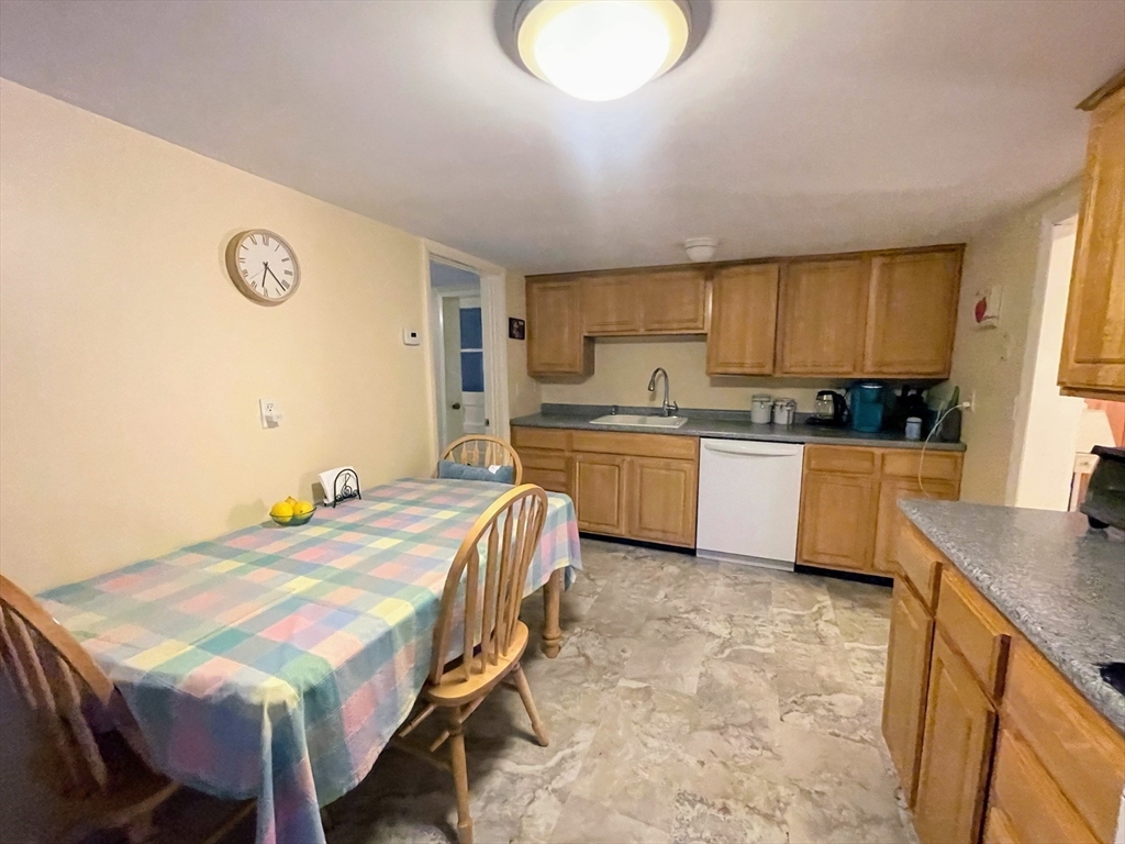 36 Old Battery Road Townsend, MA 01474 - Photo 17 of 33 a bed room with a bed and a table