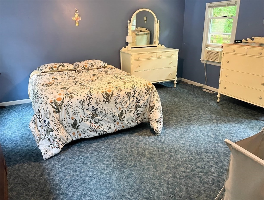 36 Old Battery Road Townsend, MA 01474 - Photo 22 of 33 a bedroom with a bed and a dresser