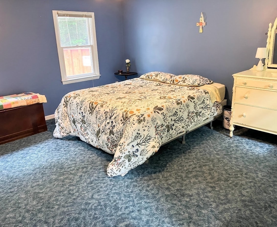 36 Old Battery Road Townsend, MA 01474 - Photo 23 of 33 a bedroom with a bed and window