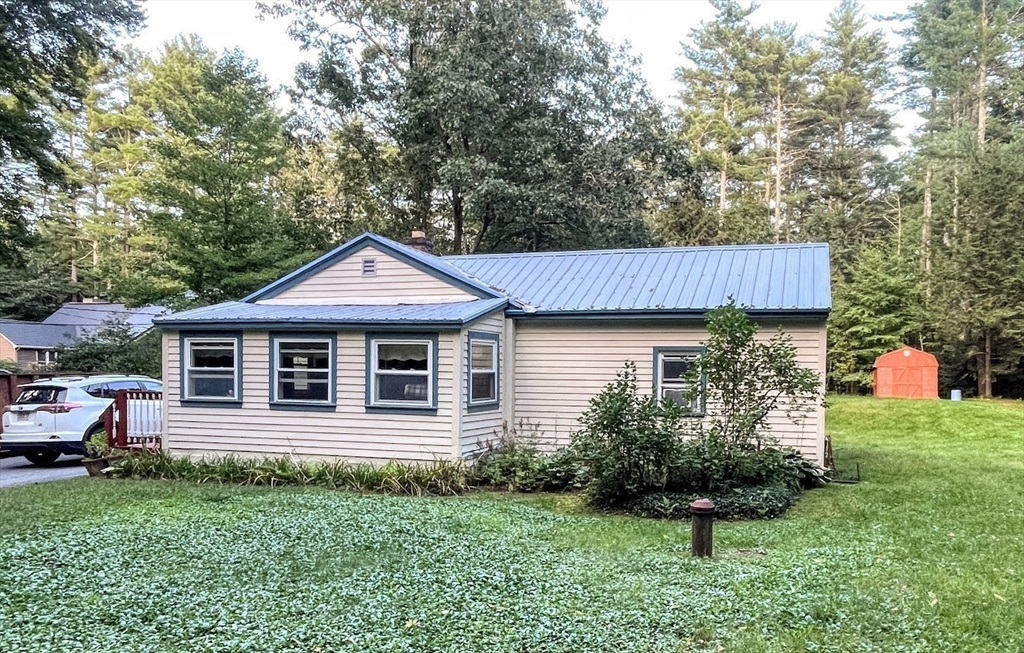 36 Old Battery Road Townsend, MA 01474 - Photo 6 of 33 a front view of a house with a yard