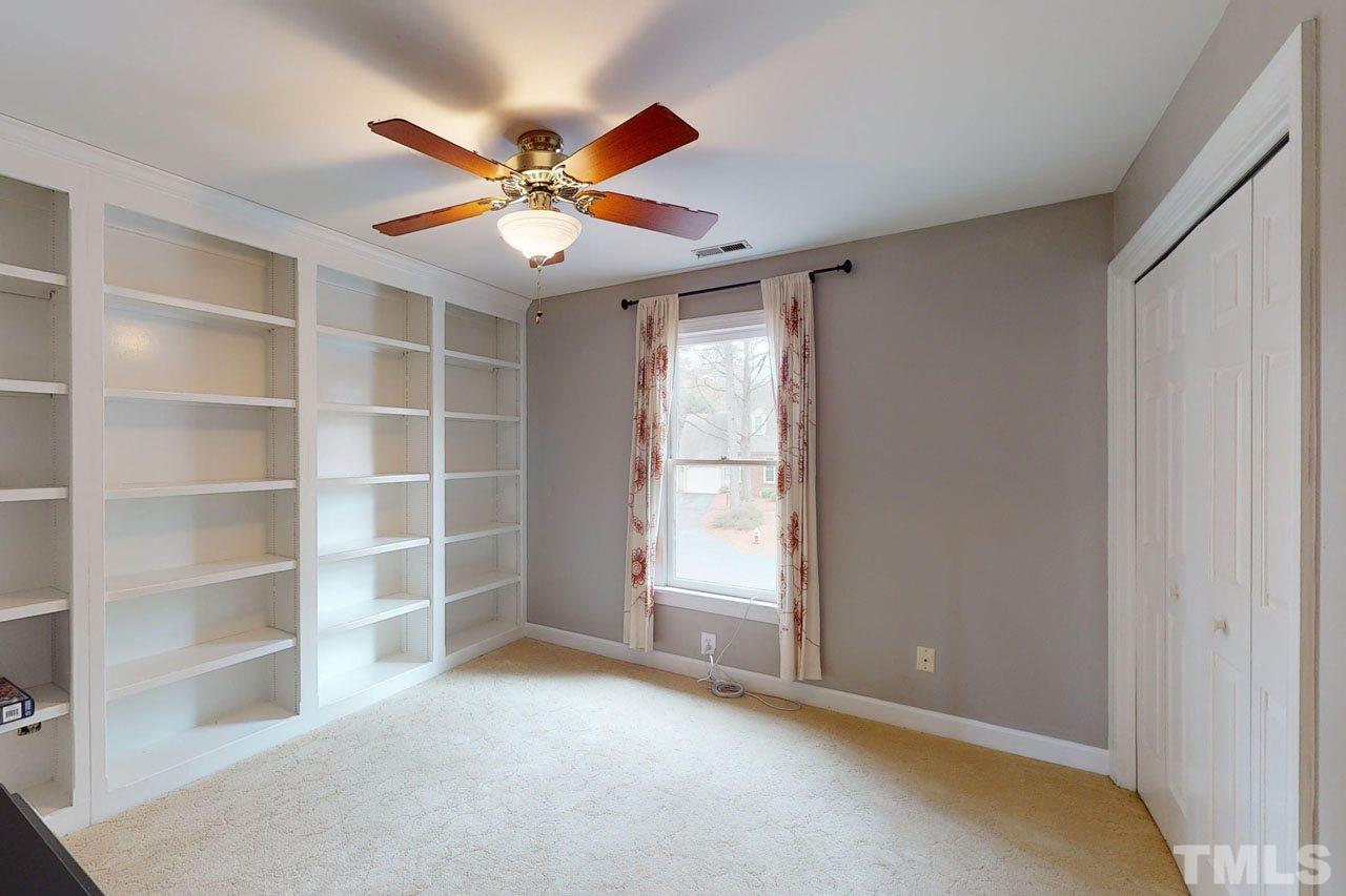 6008 Cobridge Square Raleigh, NC 27609 - Photo 18 of 30 2nd bedroom or office has awesome built in bookcases!