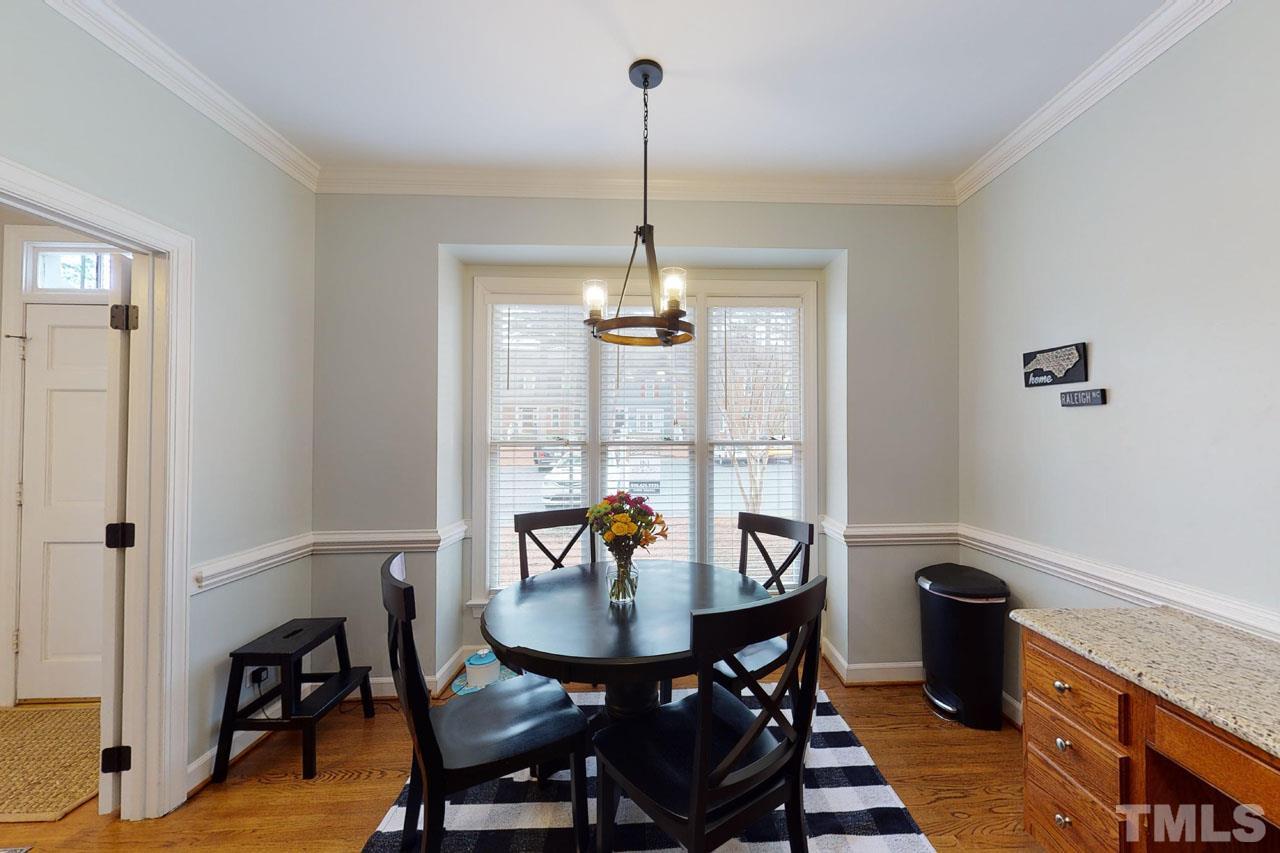 6008 Cobridge Square Raleigh, NC 27609 - Photo 3 of 30 Cute dining area in kitchen has doors for privacy off foyer
