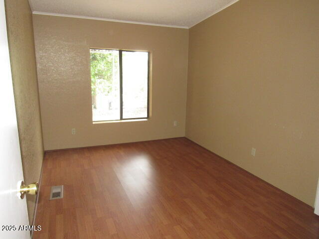3411 South Camino Seco, Unit 443 Tucson, AZ 85730 - Photo 9 of 20 an empty room with a window