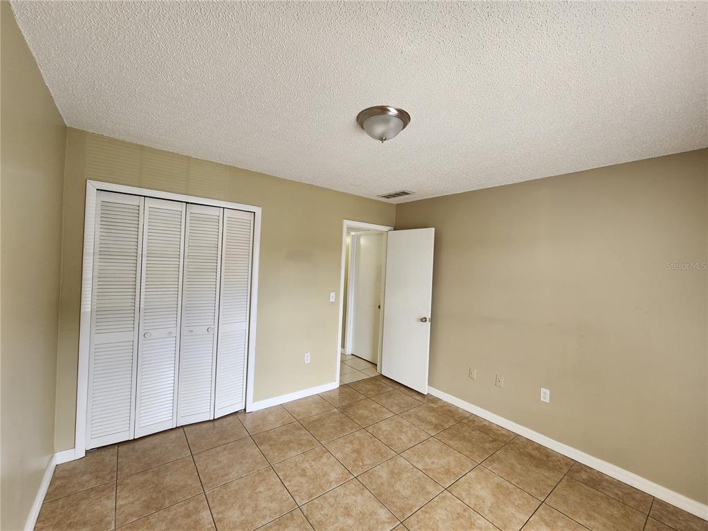 5228 Curry Ford Road, Unit 320 Orlando, FL 32812 - Photo 18 of 19 a view of an empty room