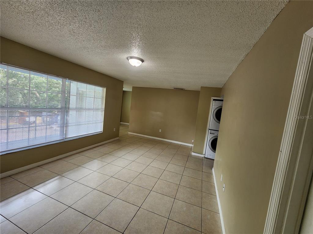 5228 Curry Ford Road, Unit 320 Orlando, FL 32812 - Photo 5 of 19 a view of an empty room and a window