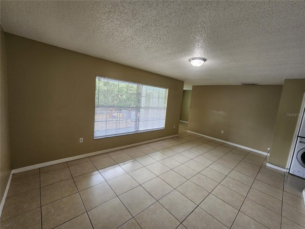 5228 Curry Ford Road, Unit 320 Orlando, FL 32812 - Photo 9 of 19 a view of an empty room with a window