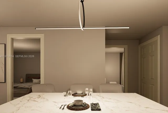 a view of a dining table and chairs