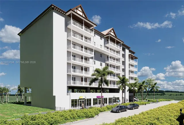 a front view of a building with garden