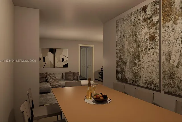 a kitchen with a sink cabinets and wooden floor