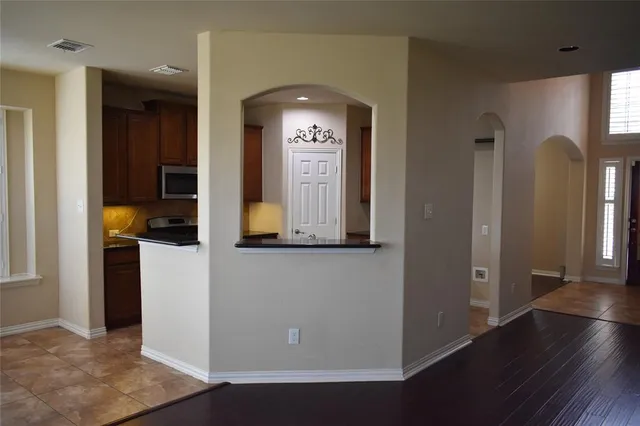 a view of entryway with wooden floor