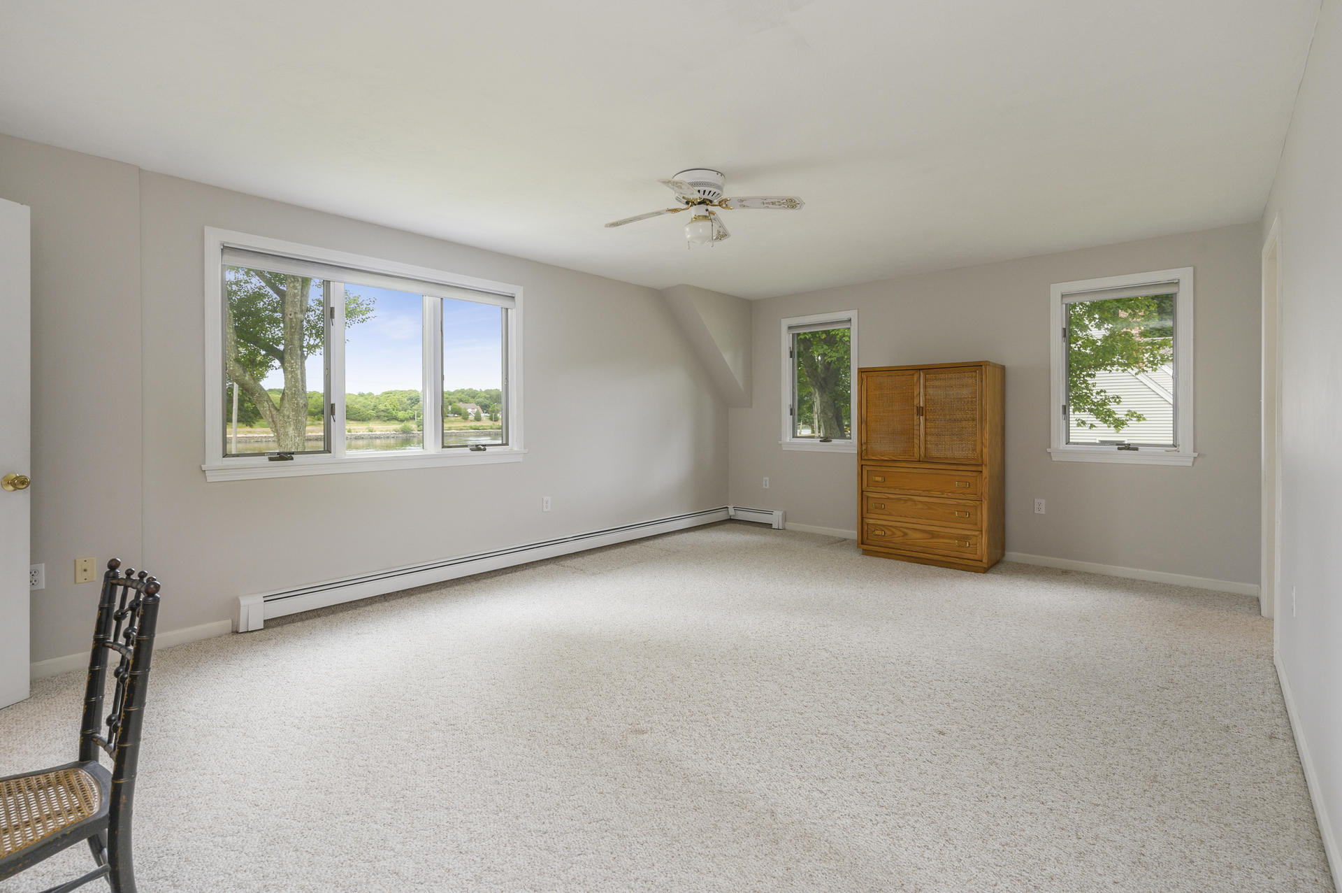 12 Pleasure Point Road Sagamore, MA 02561 - Photo 13 of 29 an empty room with windows and closet