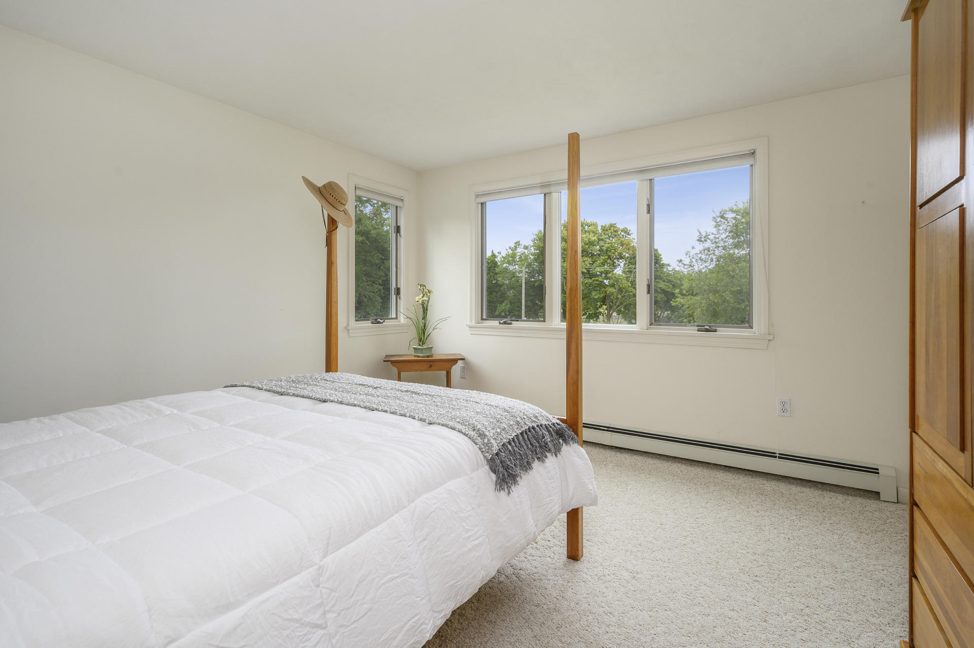 12 Pleasure Point Road Sagamore, MA 02561 - Photo 16 of 29 a bedroom with a large bed and a large window