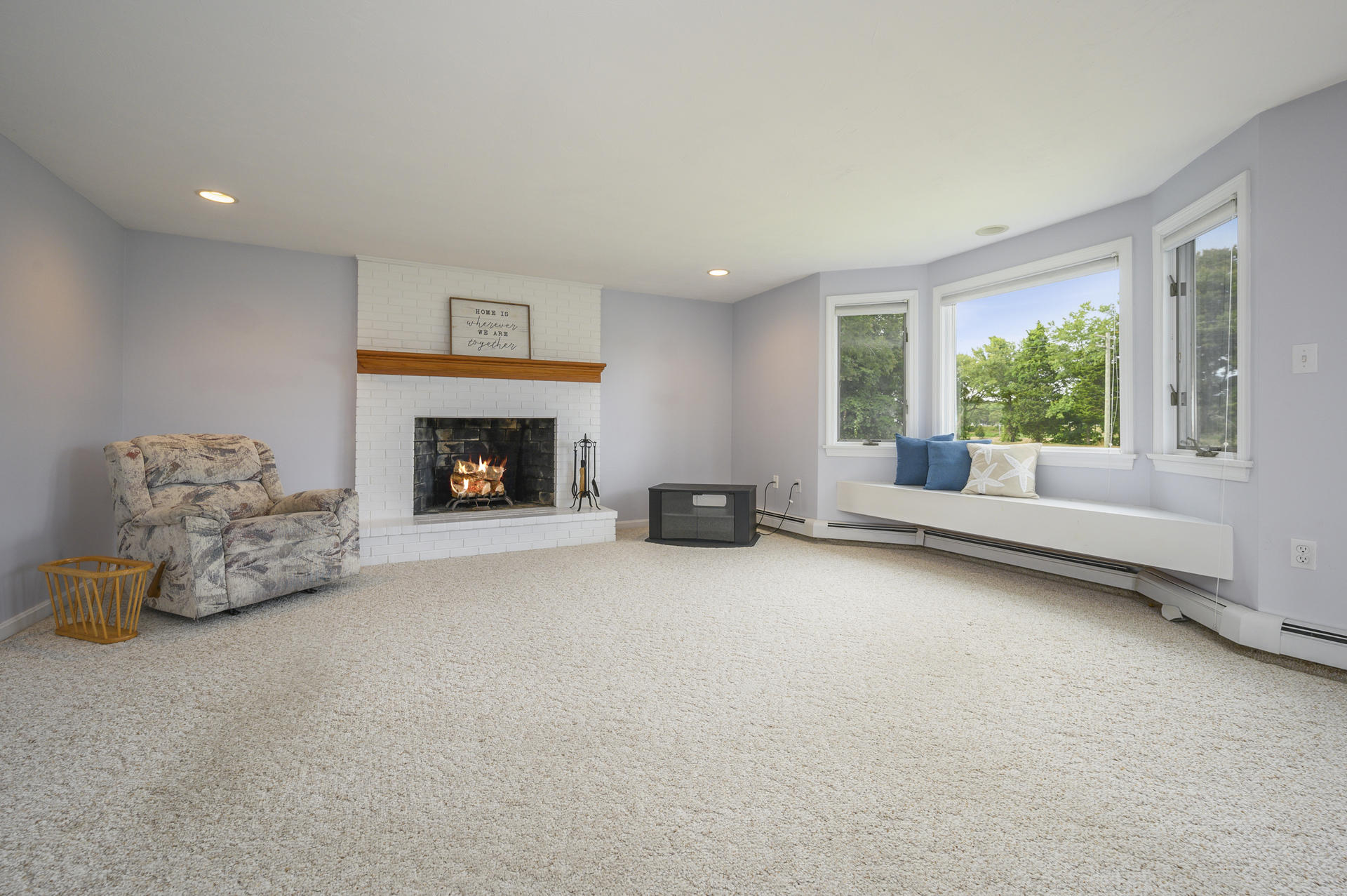 12 Pleasure Point Road Sagamore, MA 02561 - Photo 6 of 29 a living room with furniture and a fireplace