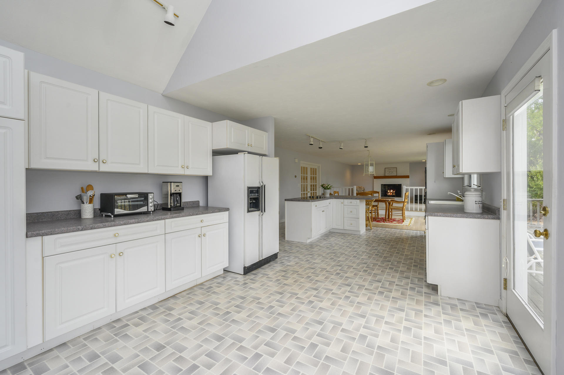12 Pleasure Point Road Sagamore, MA 02561 - Photo 8 of 29 a kitchen with refrigerator and cabinets