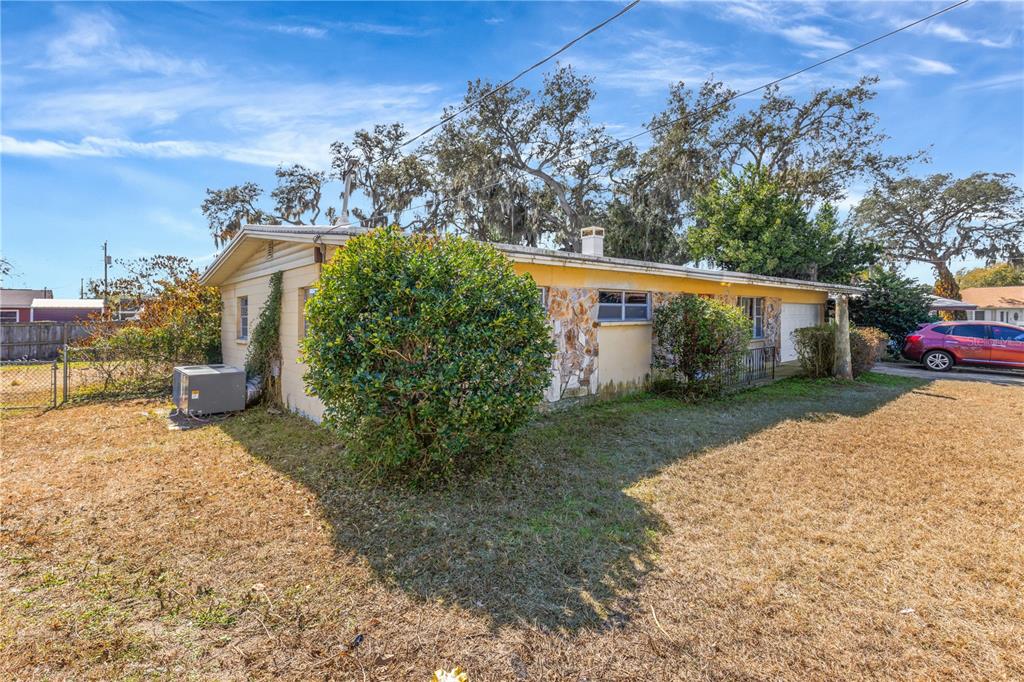 310 Kenmore Road Brandon, FL 33511 - Photo 31 of 33 a view of a house with a yard and pathway